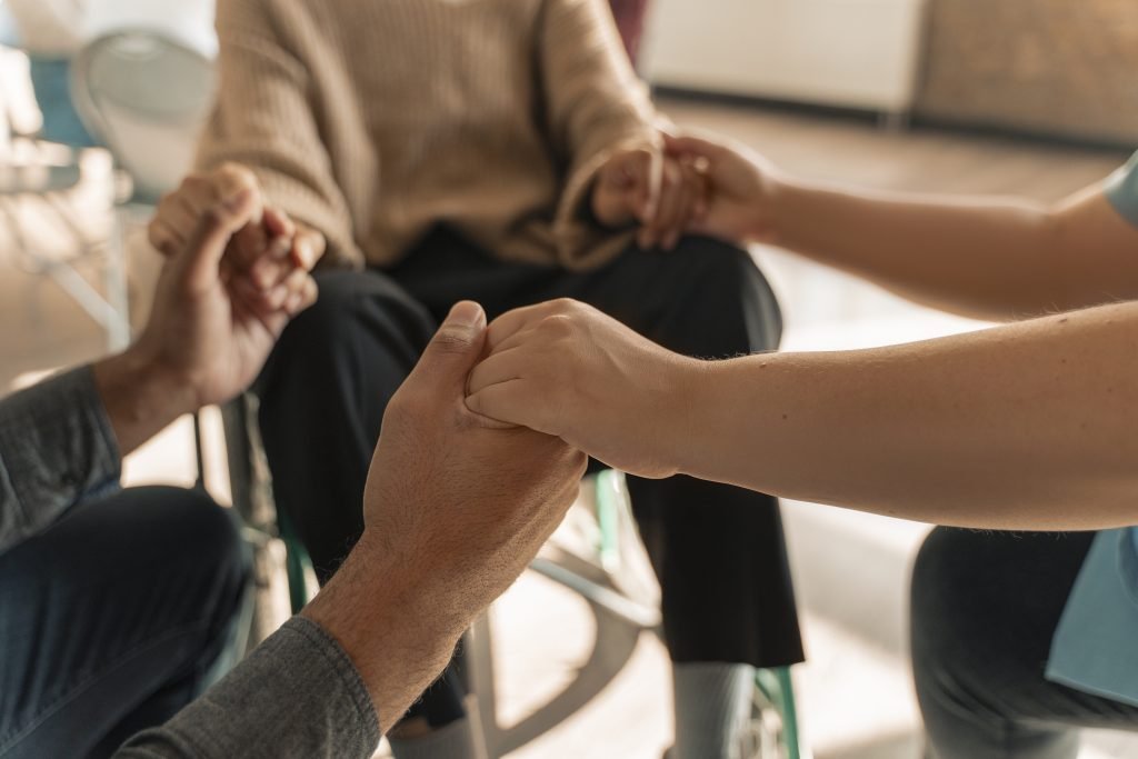 psychological therapy support group meeting scaled